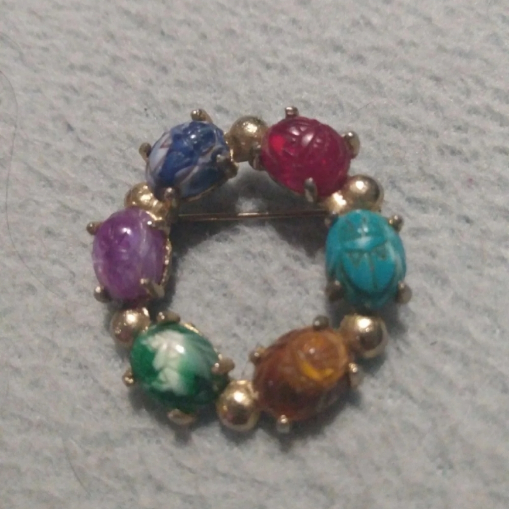 Vintage scarab brooch gold tone and marble glass